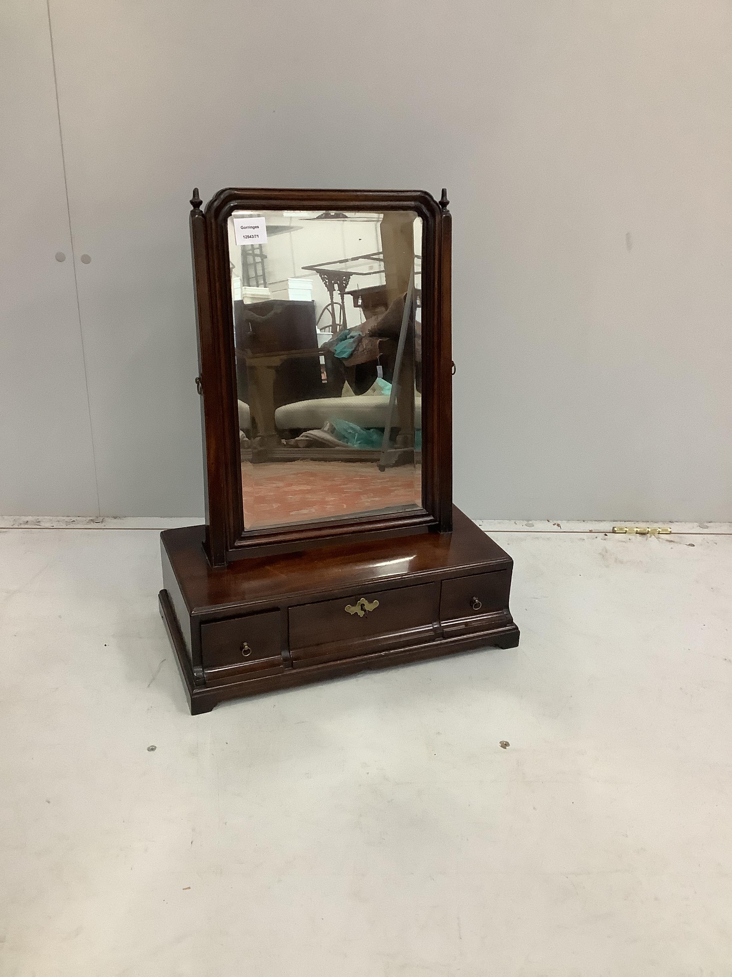 A George III mahogany toilet mirror, width 48cm, depth 26cm, height 62cm